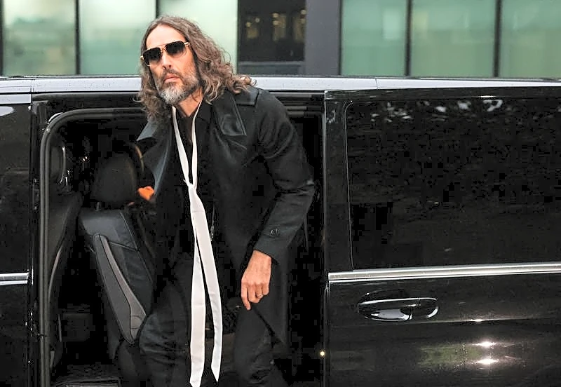 Comedian Russell Brand anally raped me, woman tells UK trial