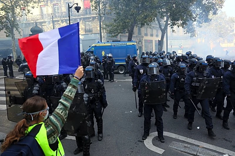 France's Macron vows order, calls foreign criticism of unrest 'stupid'