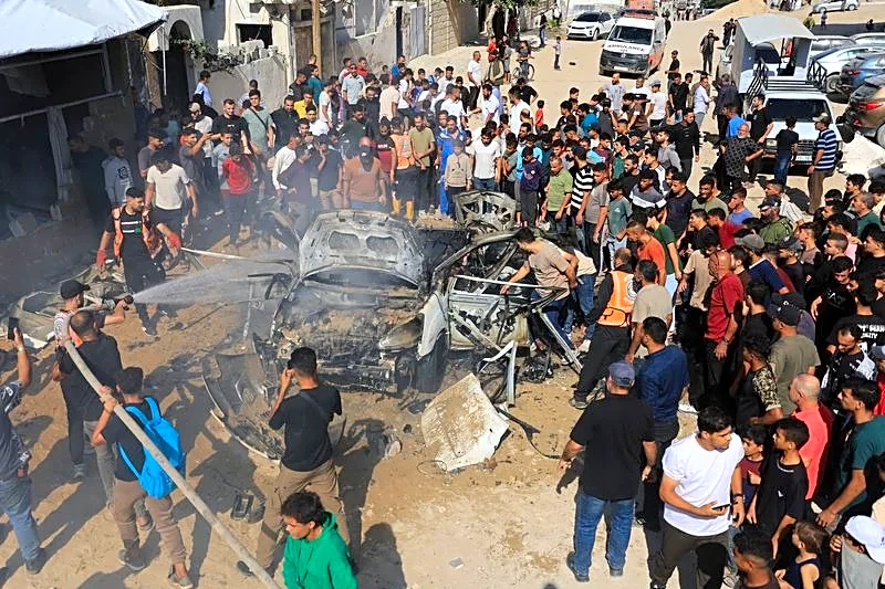 Israeli fire kills three people in Gaza, medics say