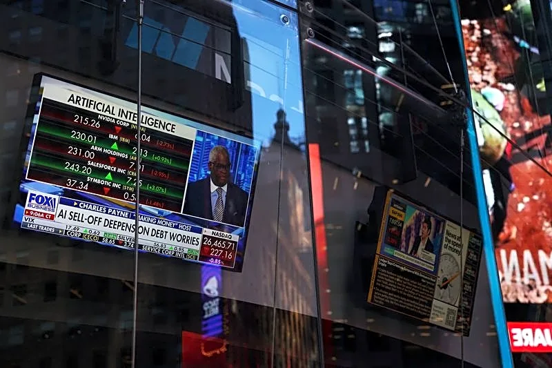 Wall St set for lower open as AI jitters rekindle, oil gains