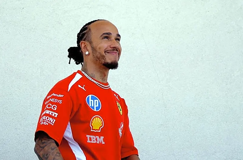 Motor racing-Hamilton says he could keep going now that African race is planned