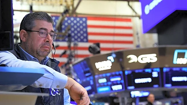 Stocks fall, but tech shares steady after selloff; oil hits highest in nearly six months