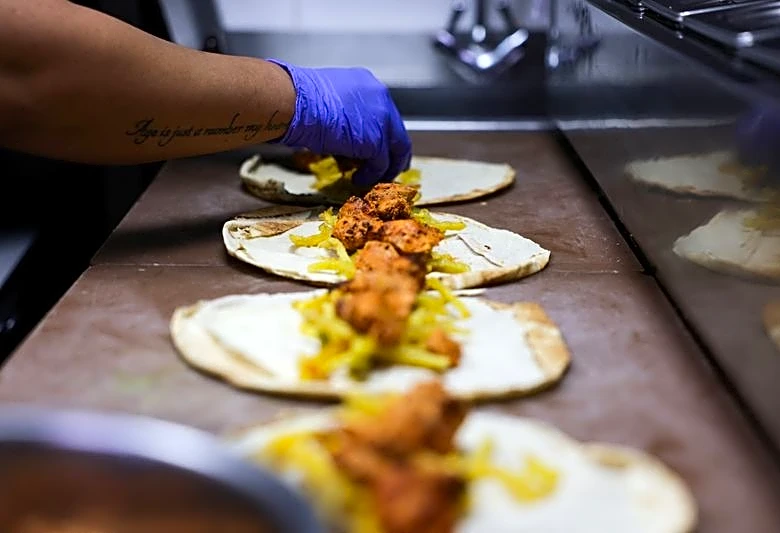 Beirut's $13 chicken sandwich becomes symbol of Lebanon divide