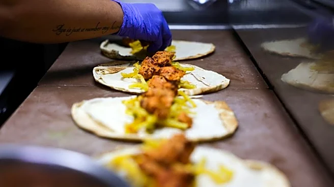 Beirut's $13 chicken sandwich becomes symbol of Lebanon divide