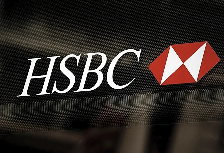 HSBC's third-quarter revenue misses estimates, shares slide