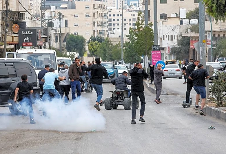 Palestinians protest against military demolitions in West Bank as Israelis vote