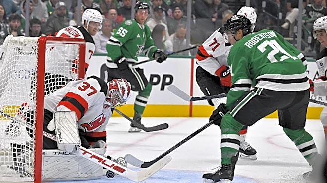 NHL roundup: Connor Hellebuyck shuts down Stars to win Devils debut