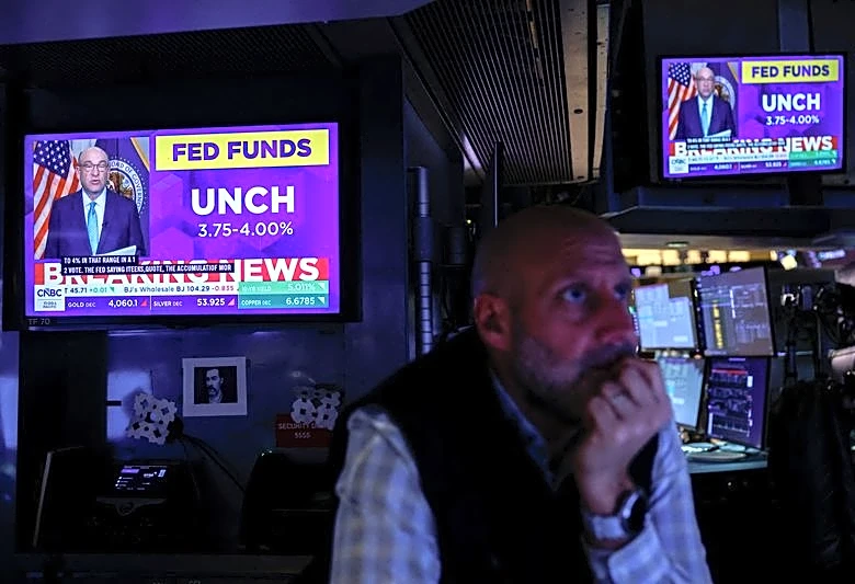 Wall Street ends higher as Fed holds key rate steady, focus turns to earnings