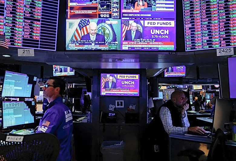 Trading Day: Fed pauses, Big Tech reports