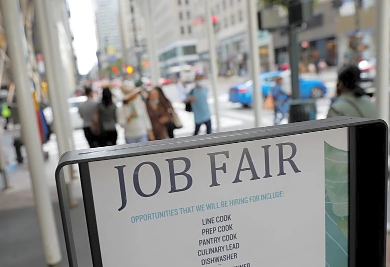 US weekly jobless claims hover near 57-year lows