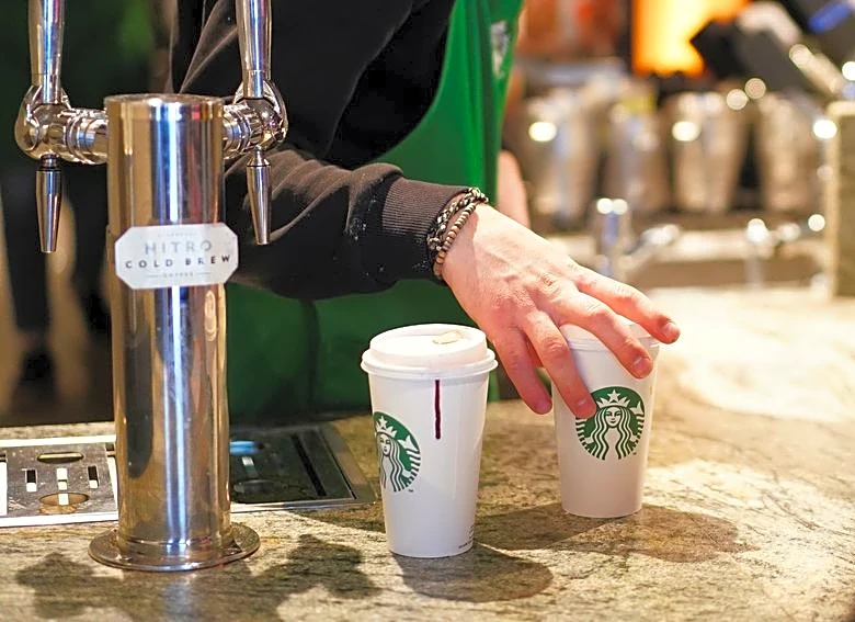 Starbucks sees annual profit above estimates as turnaround gains traction