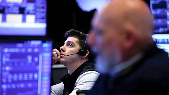 Stocks sink, bonds leap as AI giants' spending spooks investors