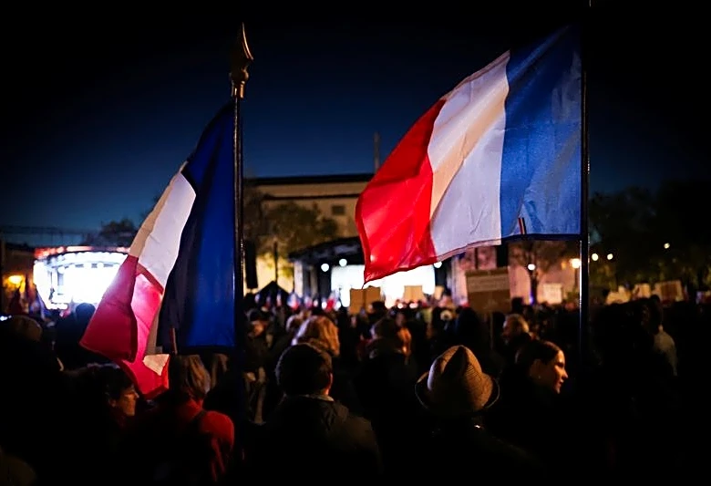 Thousands gather in Paris suburb in tribute to victims of shooting