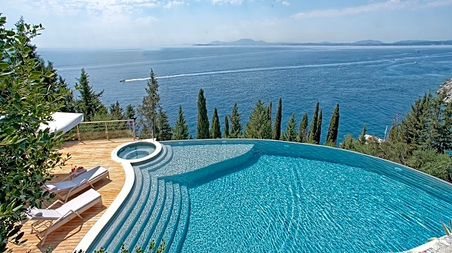 This $10.8 Million Home in Corfu Is Carved Into a Rocky Cliff Above the Ionian Sea