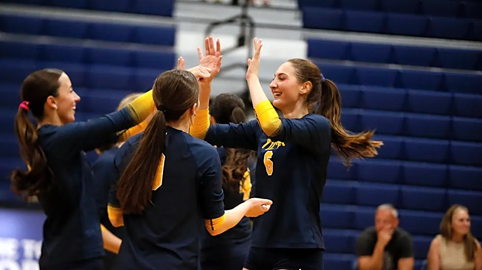 Victor volleyball mixes family fun with a serious playoff goal