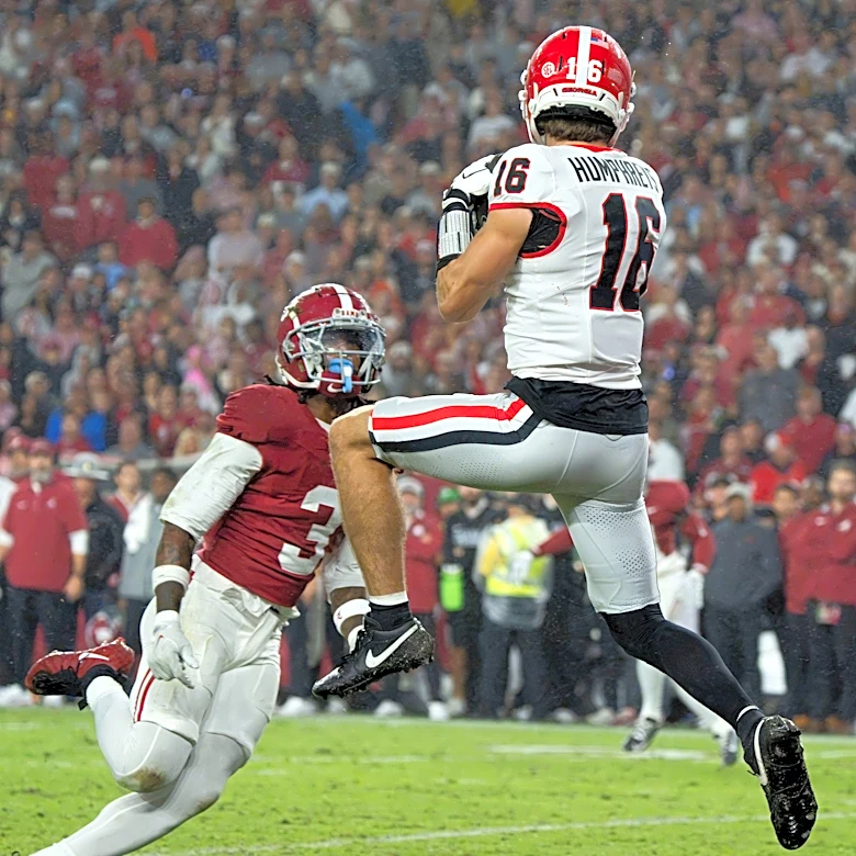How far did Alabama football fall in US LBM Coaches Poll after Georgia loss?
