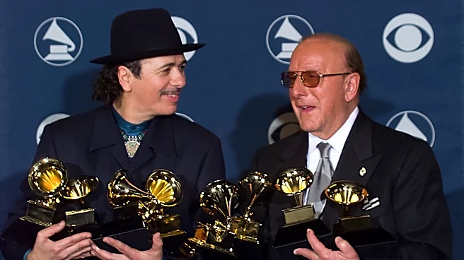 Carlos Santana Remembers ‘Visionary’ Record Exec Clive Davis: He ‘Recognized the Light in People’