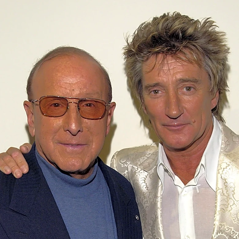 ‘A Giant of a Man’: Rod Stewart, Carlos Santana, Patti Smith, More Pay Tribute to Clive Davis