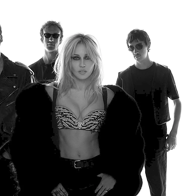 Miley Wants to Be Saved by a ‘Different Religion’ in Cinematic New Video