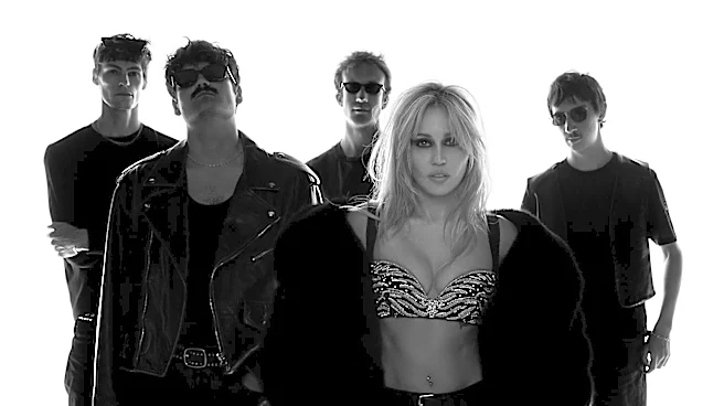 Miley Wants to Be Saved by a ‘Different Religion’ in Cinematic New Video