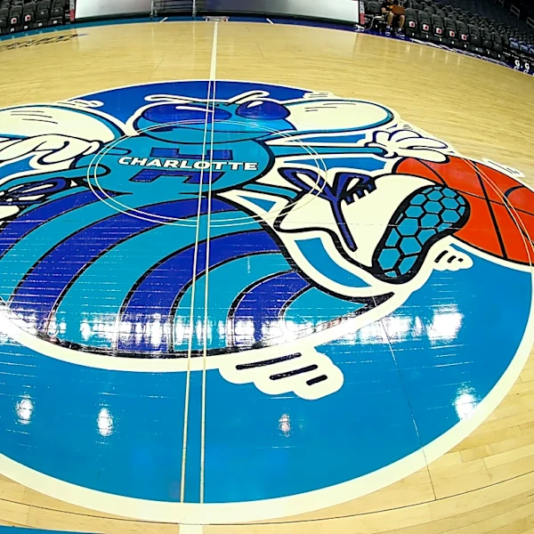 Charlotte Hornets announcer broadcasts college football kickoff
