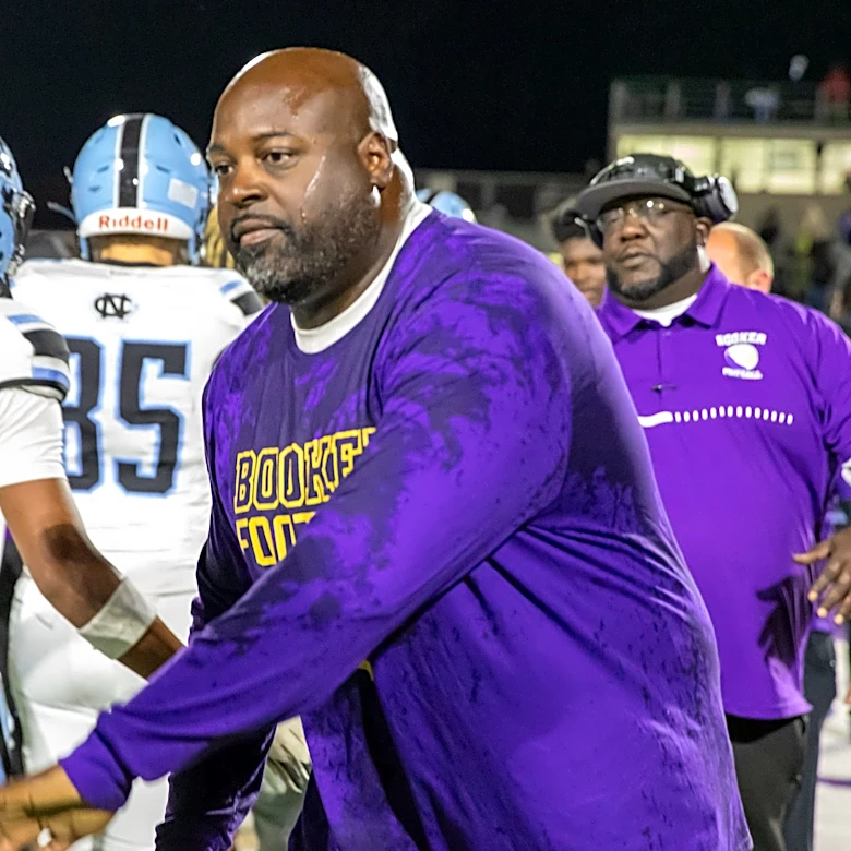 What we know about Carlos Woods' dismissal and Booker High football