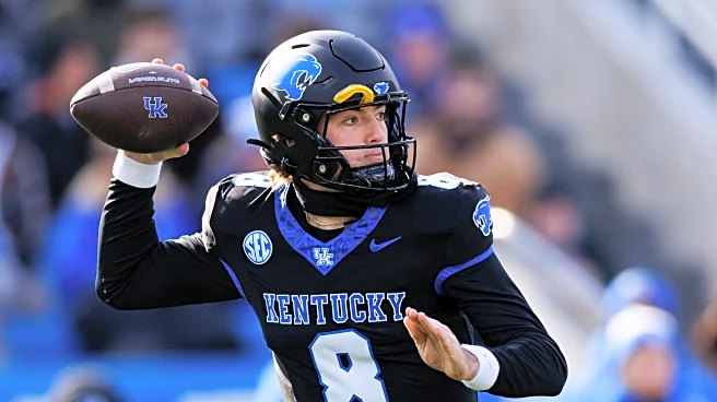 UK weighs experience vs. future in quarterback battle