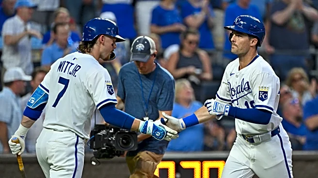 Royals bats come alive late, beat Rangers 5-2
