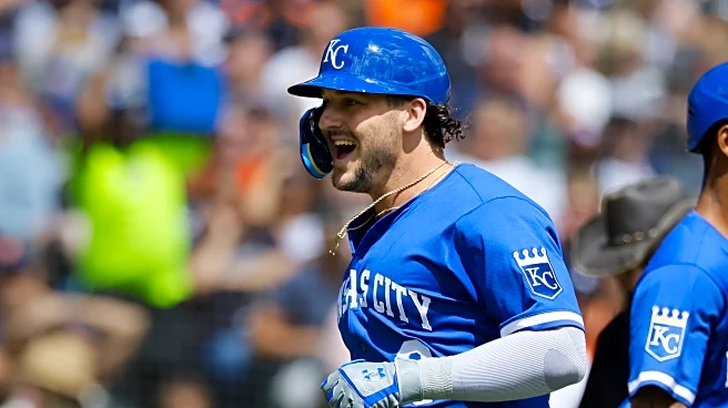 Royals win wild game in Detroit 10-8 to avoid sweep