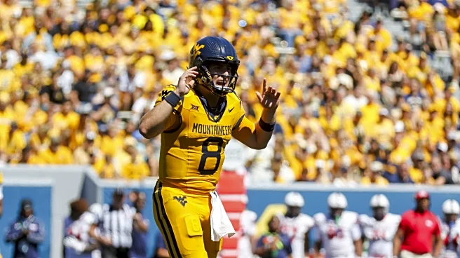 Nicco Marchiol claims the Smoking Musket Game Ball as Mountaineers roll past Robert Morris