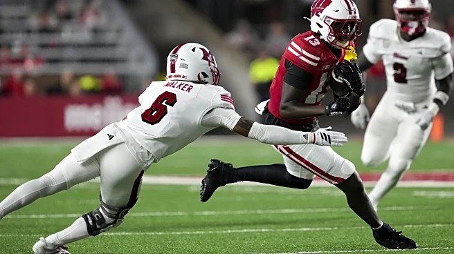 How many true freshmen have played for the Badgers in the first two weeks?