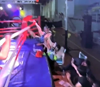 OH MY GOD! MMA fight nearly ends in disaster after rare spear sends both fighters crashing through the ropes | Video