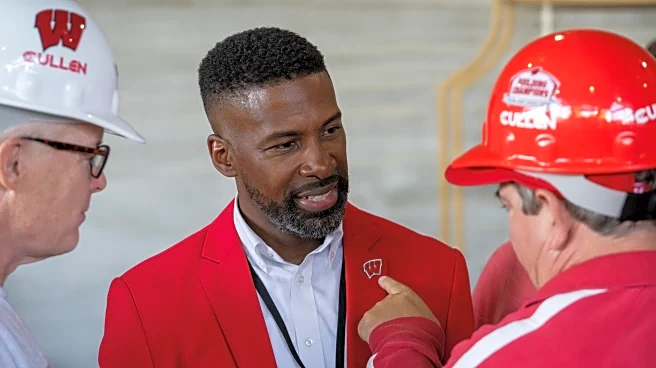 Where does Wisconsin’s GM’s salary rank among top GMs in College Football?