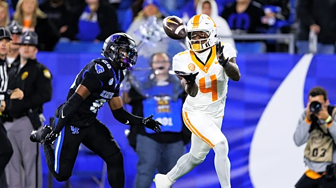 Tennessee defeats Kentucky 56-34