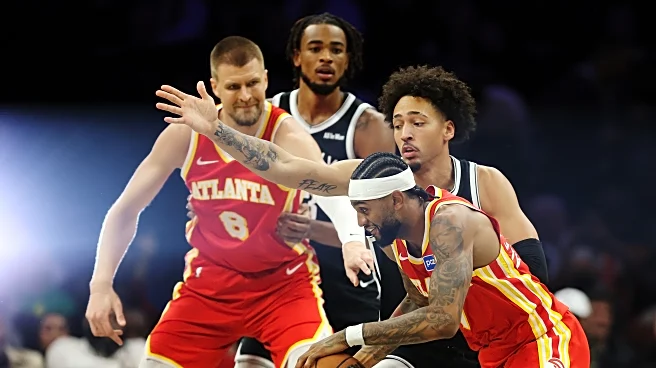 Hawks survive Nets’ late push, win 117-112