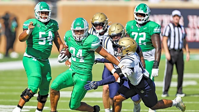 Hawkins helps North Texas spoil Navy’s undefeated season, 31-17