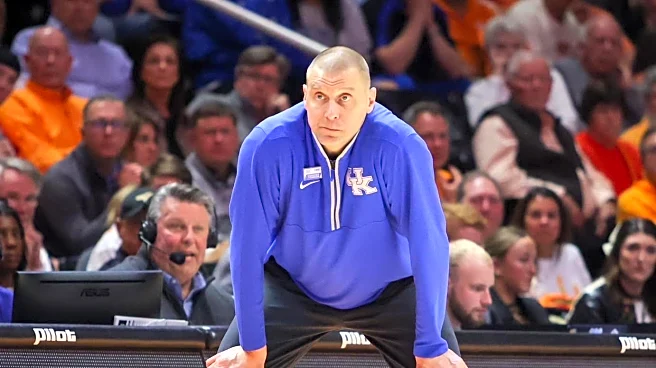 What will Kentucky’s record be vs. Louisville and Michigan State?