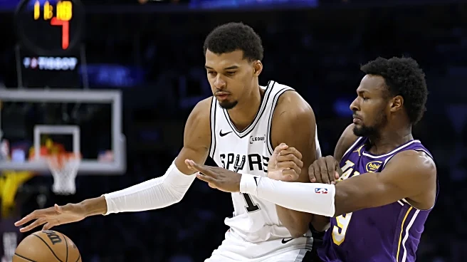 Being a Dodger and Spurs fan at a Laker game after the World Series