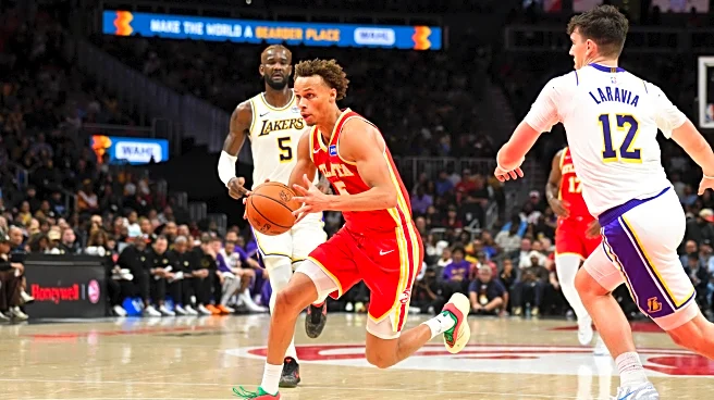 Shorthanded Hawks have big third quarter, defeat the Lakers 122-102
