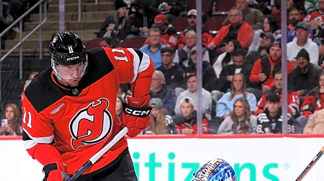 Hughes Miscues Help Isles Outlast Devils