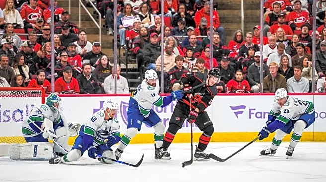Carolina Survives, Defeats Vancouver in Overtime