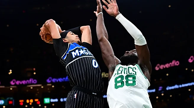 Celtics hold off late comeback, beat Magic 138-129