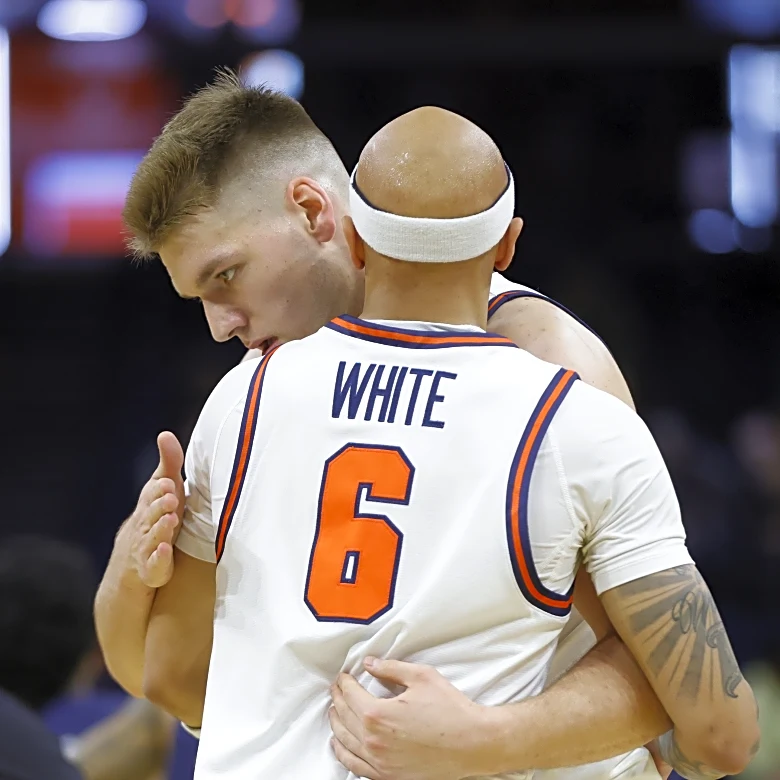 White’s perfect night powers UVA to 86-73 win against Dayton