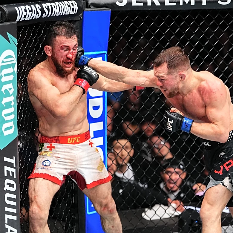 Petr Yan bloodies, batters Merab Dvalishvili to reclaim bantamweight title in UFC 323 main event