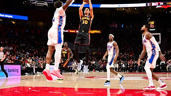 Hawks finish off 76ers in the clutch, win 120-117