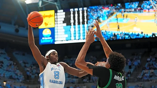 Henri Veesaar and Caleb Wilson lead UNC past ETSU