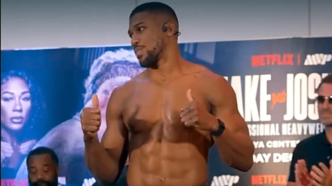 Anthony Joshua weighs in 27 pounds heavier than Jake Paul for boxing match