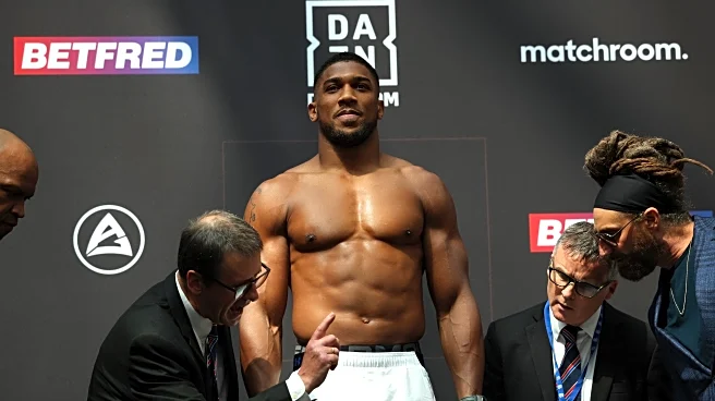 Anthony Joshua just hit the scale — and outweighed Jake Paul by nearly 30 pounds (Video)