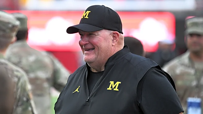 Why some players think Biff Poggi should be Michigan’s next head coach