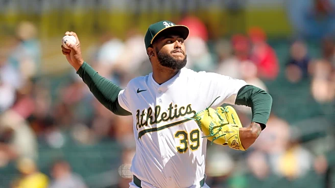 Dodgers sign Chuckie Robinson, Carlos Duran to minor league deals